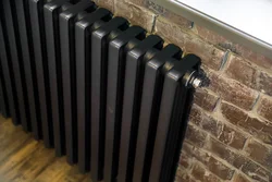 Black radiator in the kitchen photo