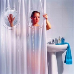 Bathtubs with plastic curtains photo