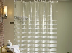 Bathtubs with plastic curtains photo