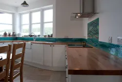 Kitchen with emerald countertop photo
