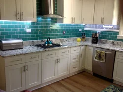 Kitchen with emerald countertop photo