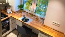 Kitchen with a single countertop photo