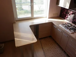 Kitchen with a single countertop photo