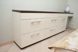 Low chest of drawers in the bedroom photo