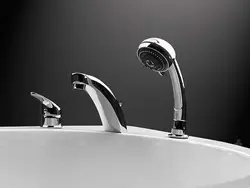 Install faucet on bathtub photo