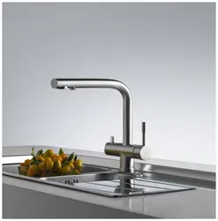 Stainless steel kitchen faucet photo