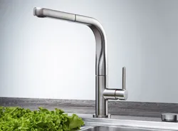 Stainless steel kitchen faucet photo