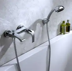 Bathtub faucet from the wall photo