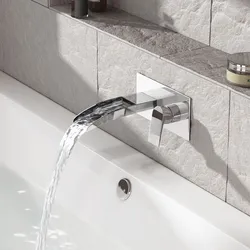 Bathtub faucet from the wall photo