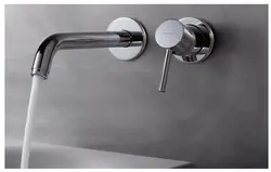 Bathtub faucet from the wall photo