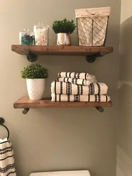 Shelves in loft bathroom photo
