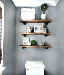 Shelves in loft bathroom photo