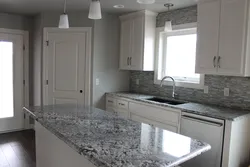Gray stone countertop kitchen photo