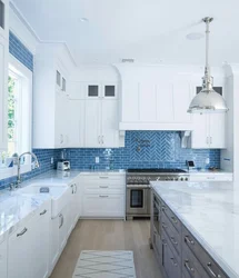 White kitchen with color photo