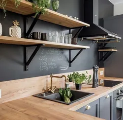 Black shelves in the kitchen photo