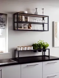 Black shelves in the kitchen photo