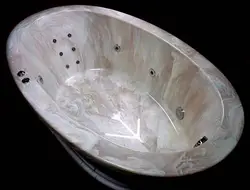 Bathtubs made of liquid stone photo