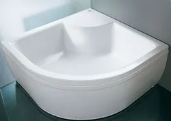 Photo of a bathtub with a deep tray