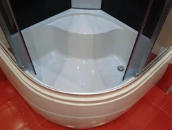 Photo of a bathtub with a deep tray