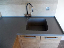 Kitchen With Cast Countertop Photo