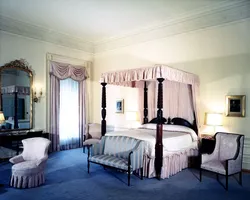 Bedroom in a white house photo