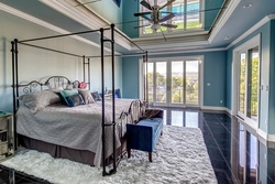 Bedroom with mirrored ceiling photo