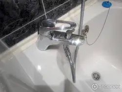 Кран на борт ванной фото