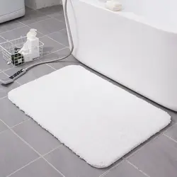 Белы кілімок для ваннай фота