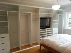 Assembling a wardrobe in the bedroom photo