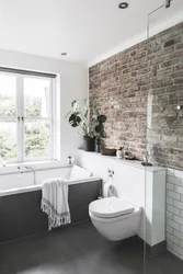 Bathtub With Brick Panels Photo