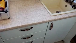 Painting countertops in the kitchen photo