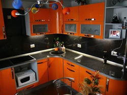 Orange Kitchen Black Countertop Photo