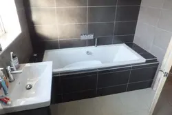 Acrylic Bathtub In Tiles Photo