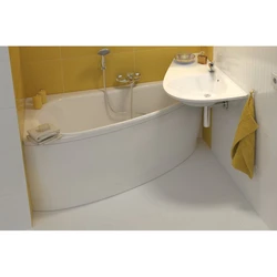 Acrylic bathtub with sink photo