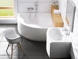 Acrylic bathtub with sink photo