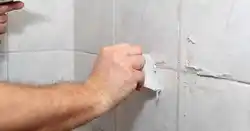 Tile joints in the bathroom photo
