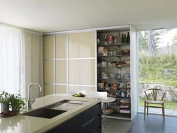 Cabinets on the wall in the kitchen photo