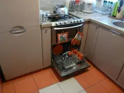 Kitchen photo with refrigerator, dishwasher