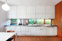 Kitchens to the ceiling with a window photo