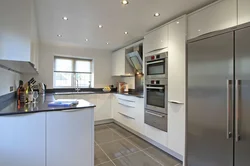 Kitchens to the ceiling with a window photo