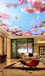 Photo wallpaper on the ceiling in the kitchen