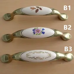 Kitchen handles with flowers photo