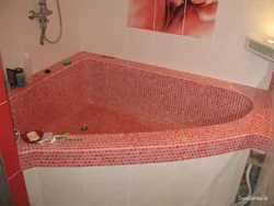 Bathtub made of bricks and tiles photo