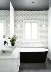 Photo of a bathroom with a black ceiling