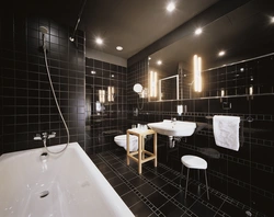Photo of a bathroom with a black ceiling