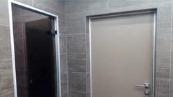 Bathroom Door Made Of Tiles Photo