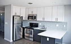 Corner kitchen with white refrigerator photo