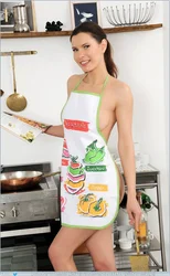 Wearing only an apron in the kitchen photo