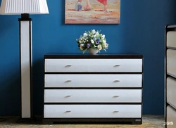 Chest of drawers on the wall in the bedroom photo