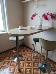 Photo Of A Small Kitchen Table Against The Wall